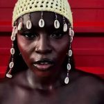 Solana, Nigerian YoruPop and Afro-fusion singer, wearing a traditional beaded headpiece