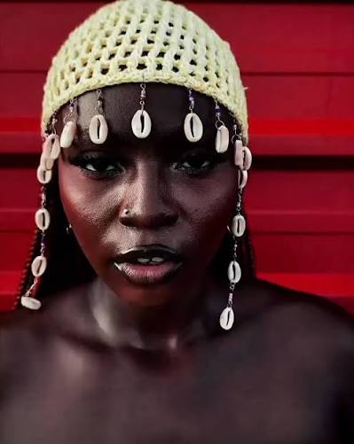 Solana, Nigerian YoruPop and Afro-fusion singer, wearing a traditional beaded headpiece